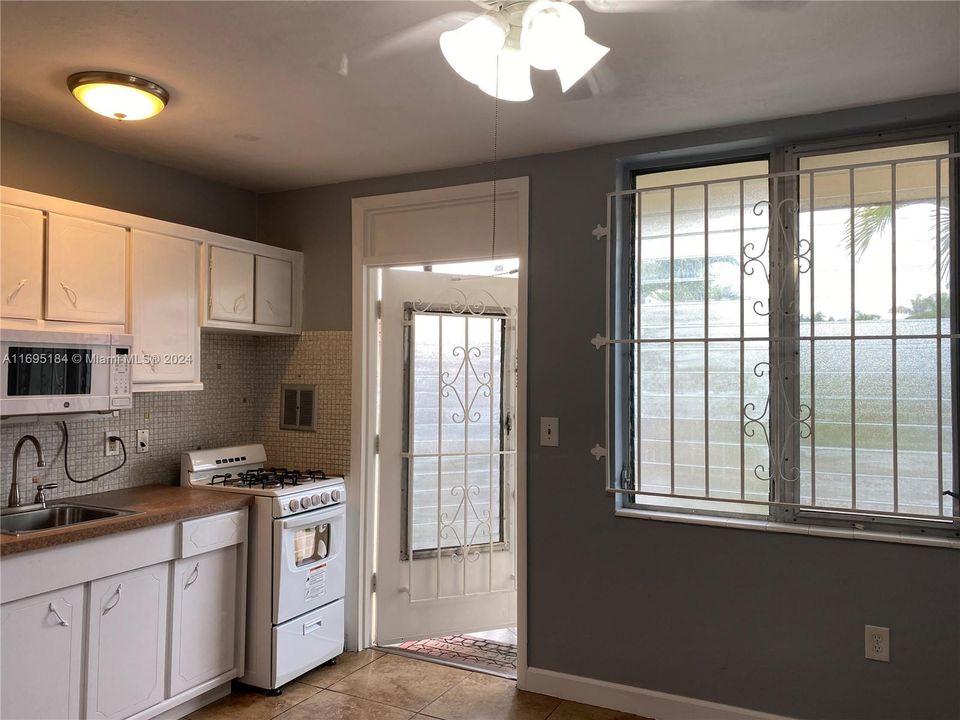 Entrance door and window. Plenty of natural light.