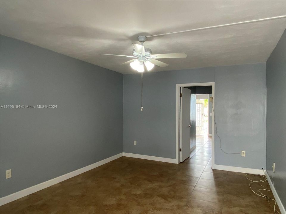 Bedroom from the terrace, showing access to hallway closet.