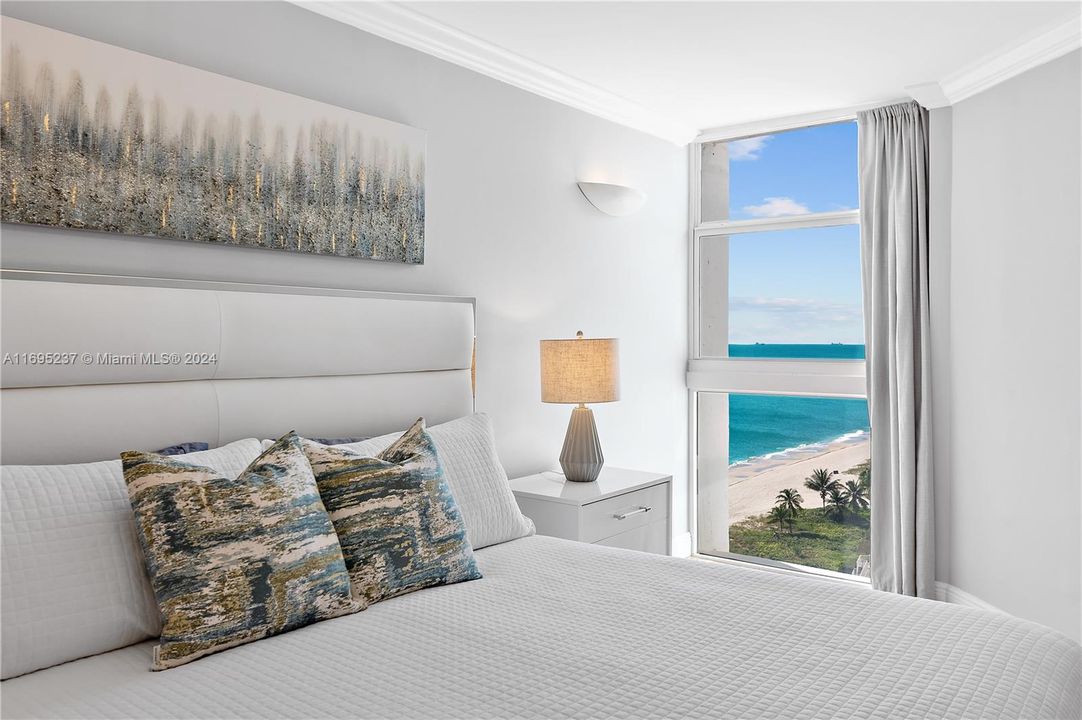 Primary bedroom with beach view