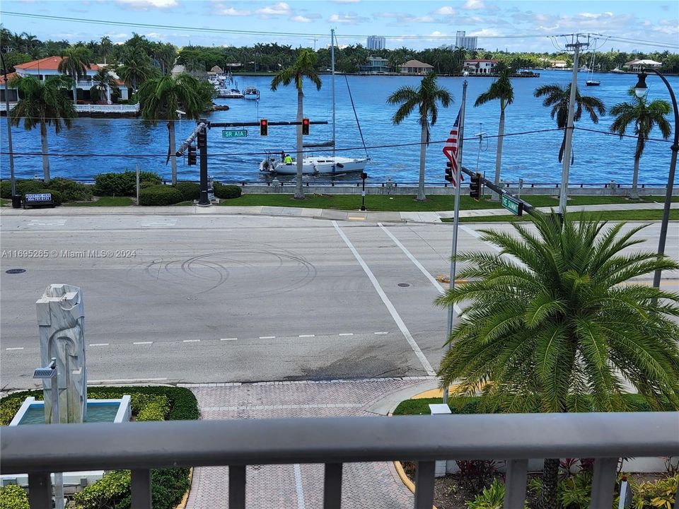 Sit at the pool deck and watch the boats go by