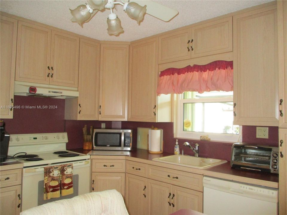 TWO SEATS AT  BREAKFAST NOOK IN KITCHEN