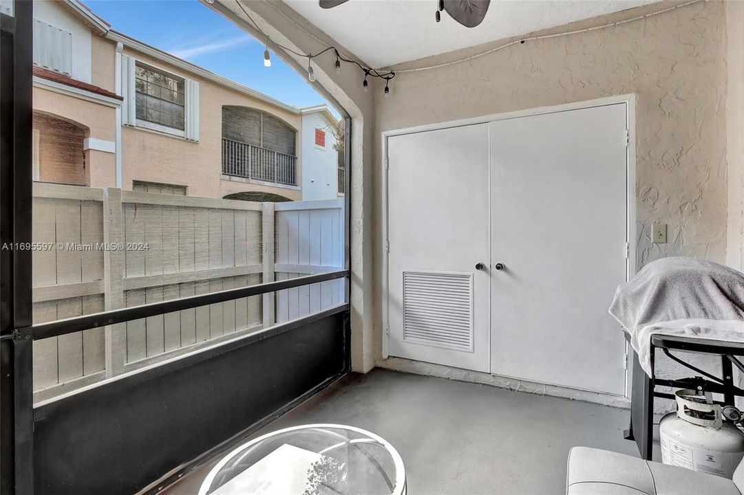 Screened in patio with laundry room closet