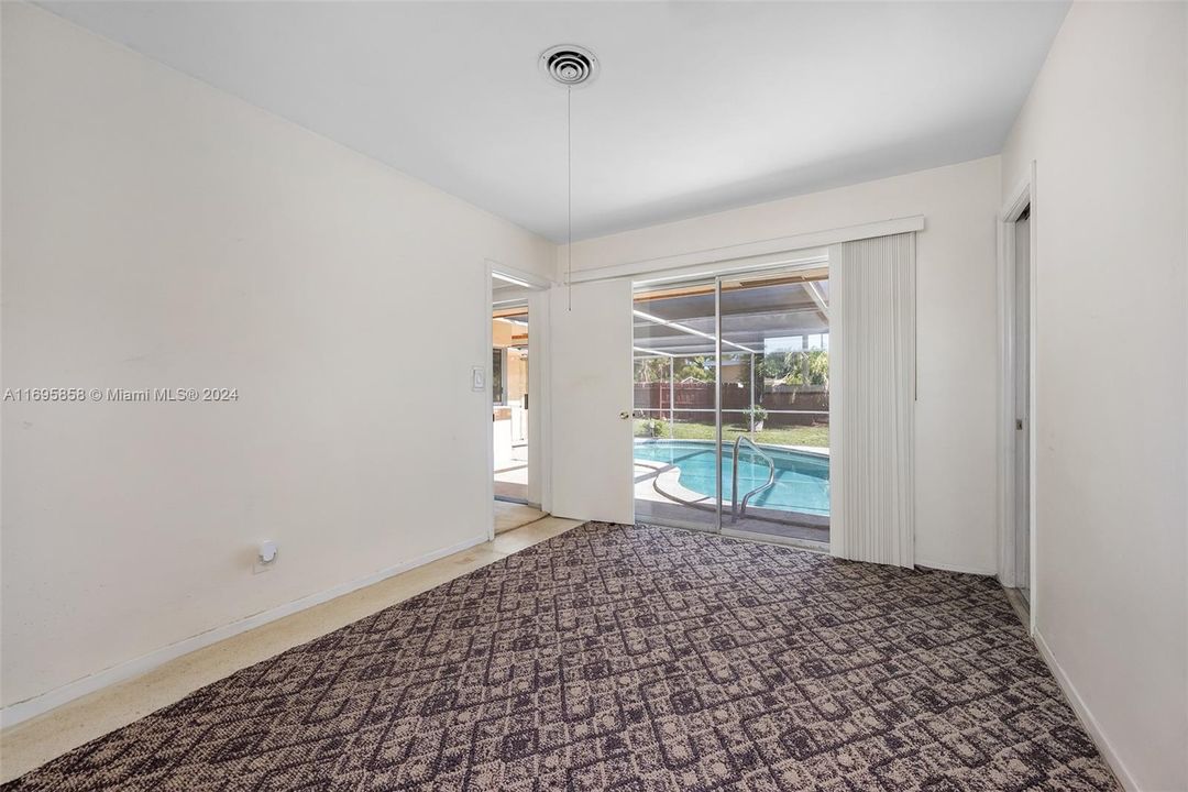 Master Bedroom with view of pool