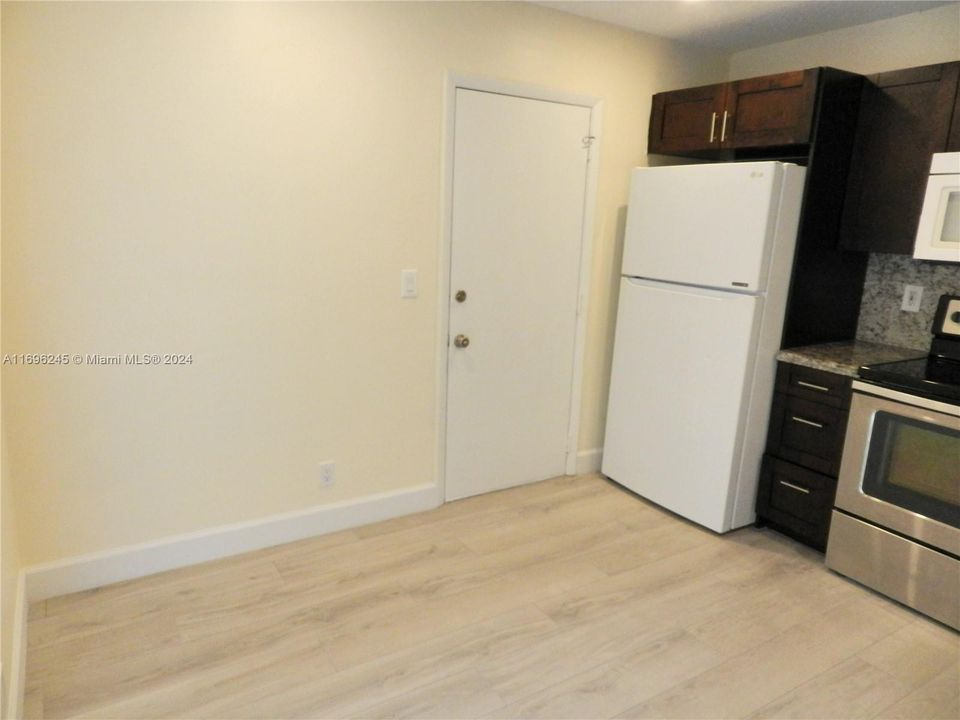 Eat in kitchen area with access into garage