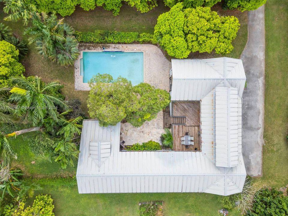 AERIAL VIEW  ALL PATIO'S AND LIVING AREA WRAPS AROUND PAVERED POOL COURTYARD THE PHOTOS DO NOT PICK UP THE VIBE OF THIS ORGANIC SPACE