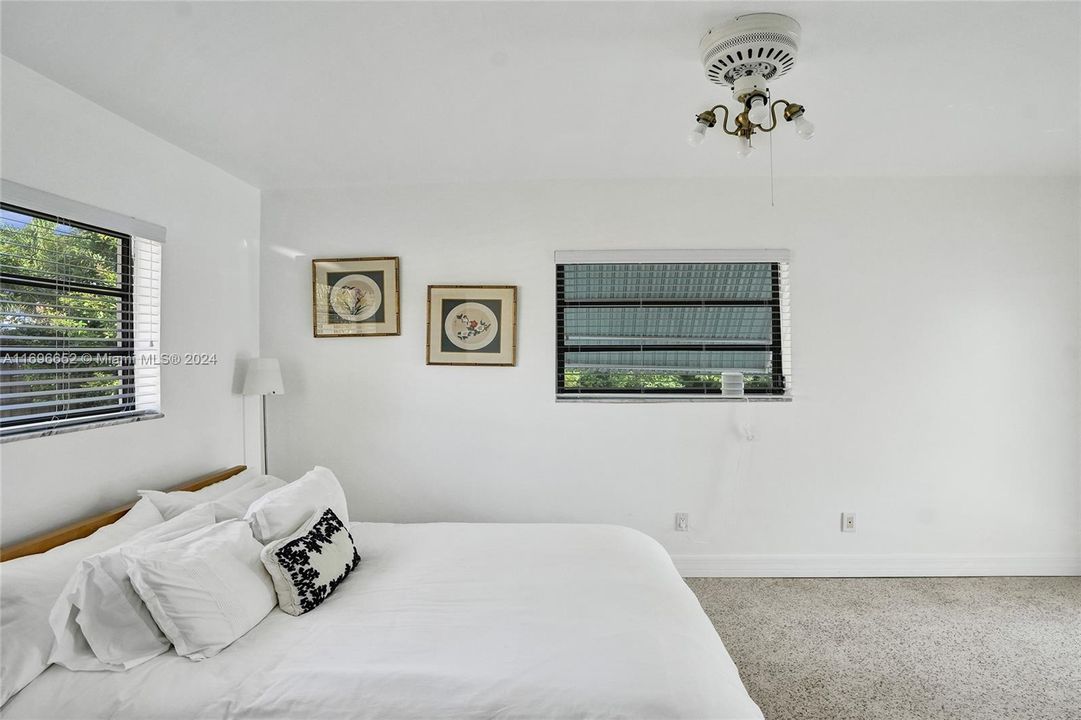 2nd bedroom, opening to pool area