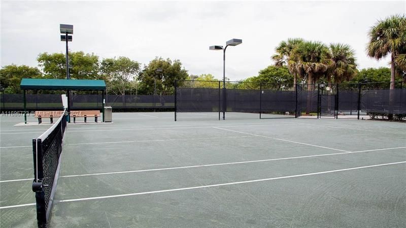 Tennis, Pickleball, Basketball, Playgrounds and Walking Paths galore in Heron Bay!