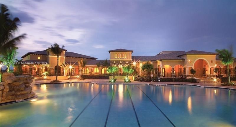 Heron Bay Commons Pool with Nightime View!