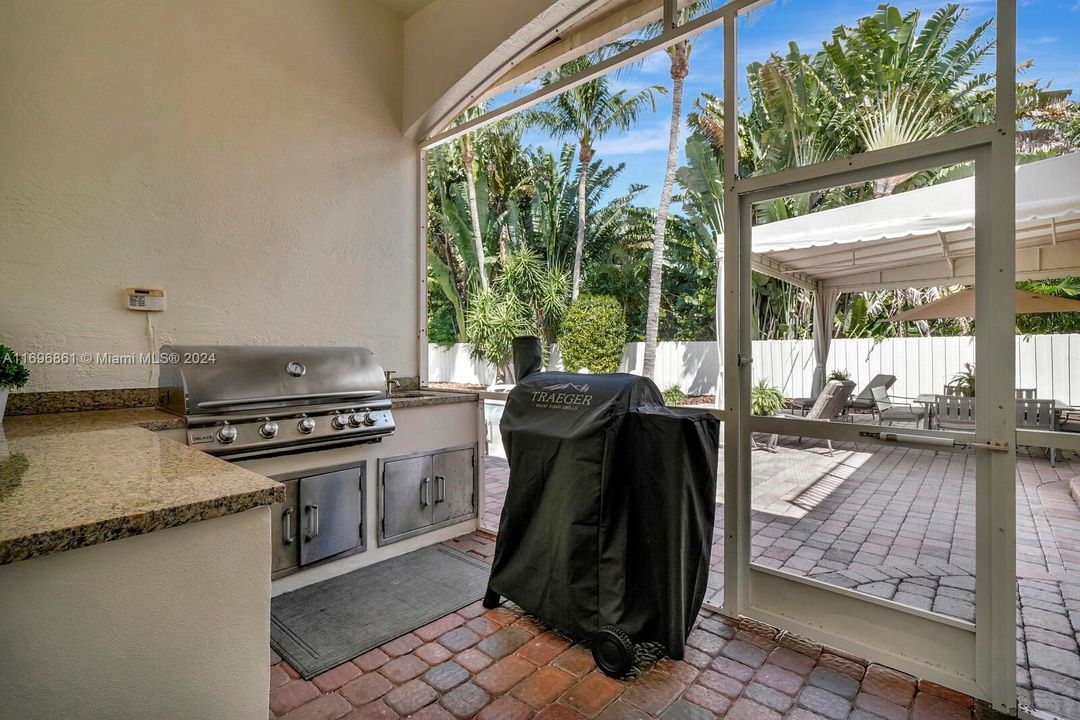 Screened outdoor kitchen