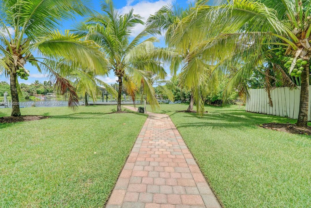 Paver walkway to Lake and boat dock