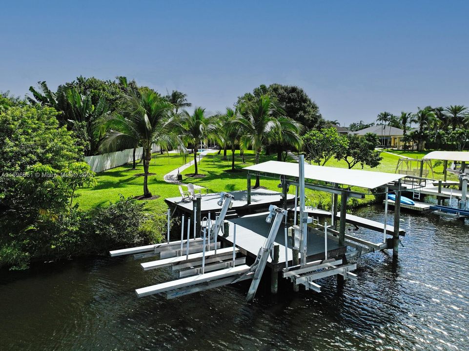 3 wave runner lifts, private boat dock