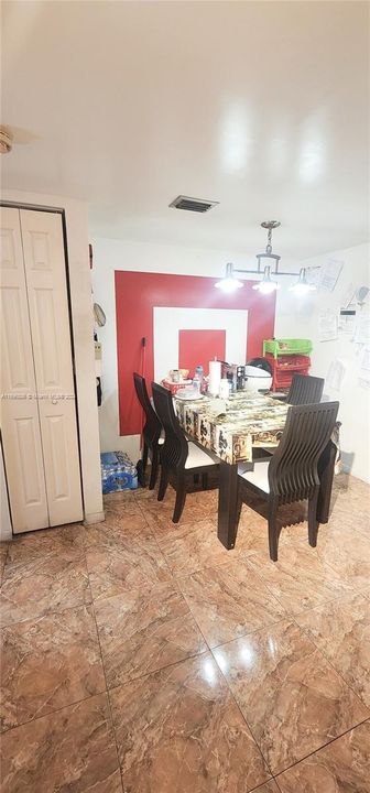 Pantry to the left of the dining room table