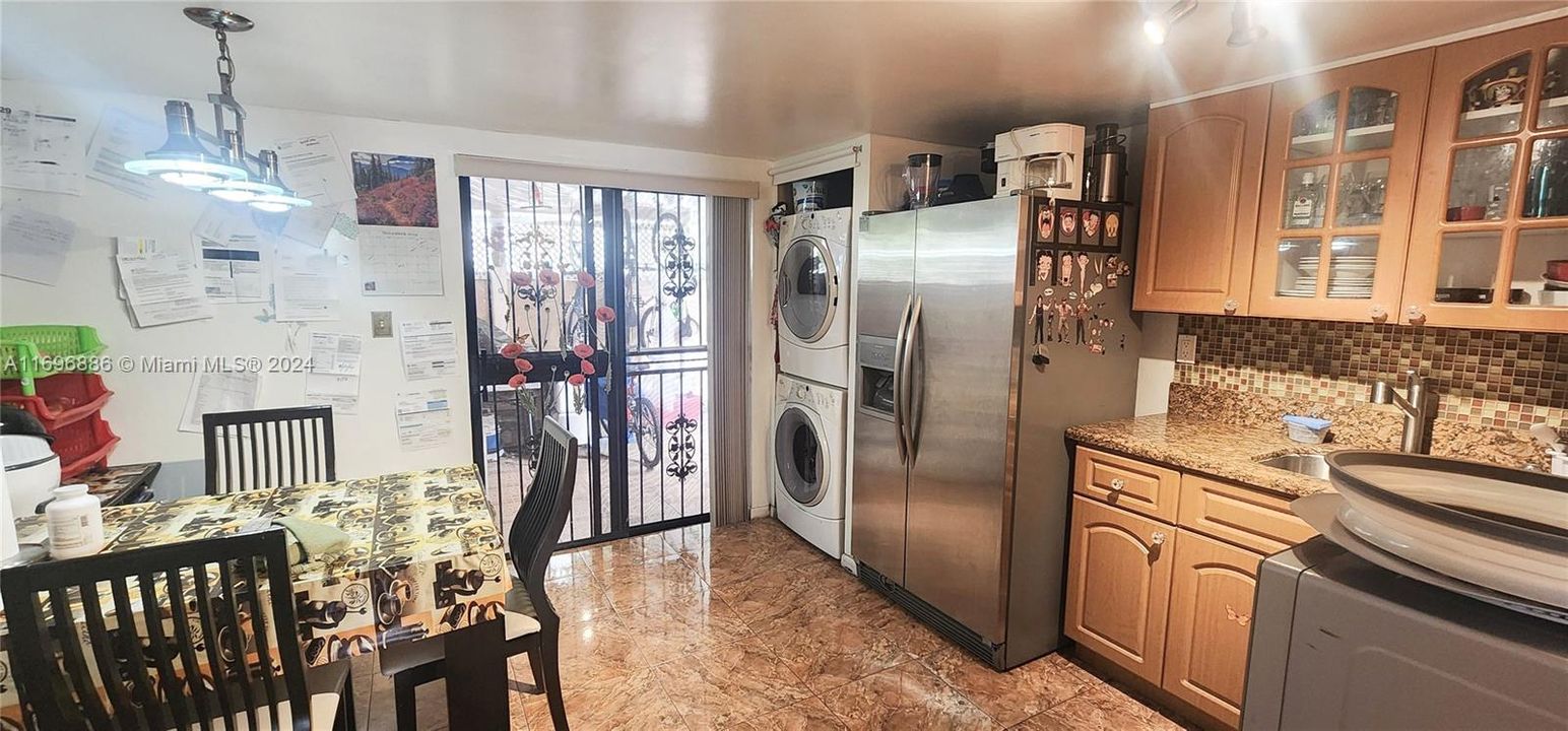 Sliding Glass doors lead to the rear patio