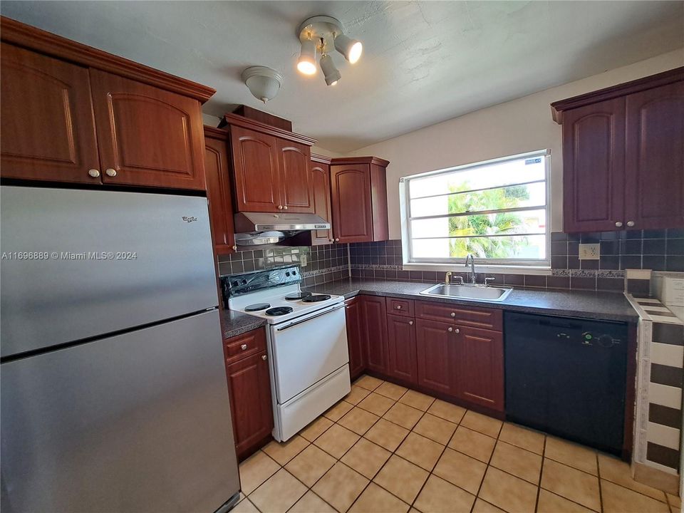 Kitchen facing front entrance