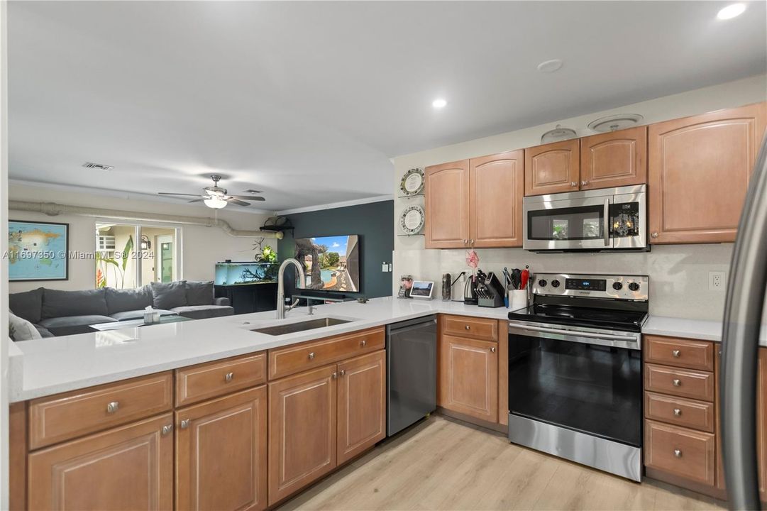 Open Kitchen to Dining Table and Family Room