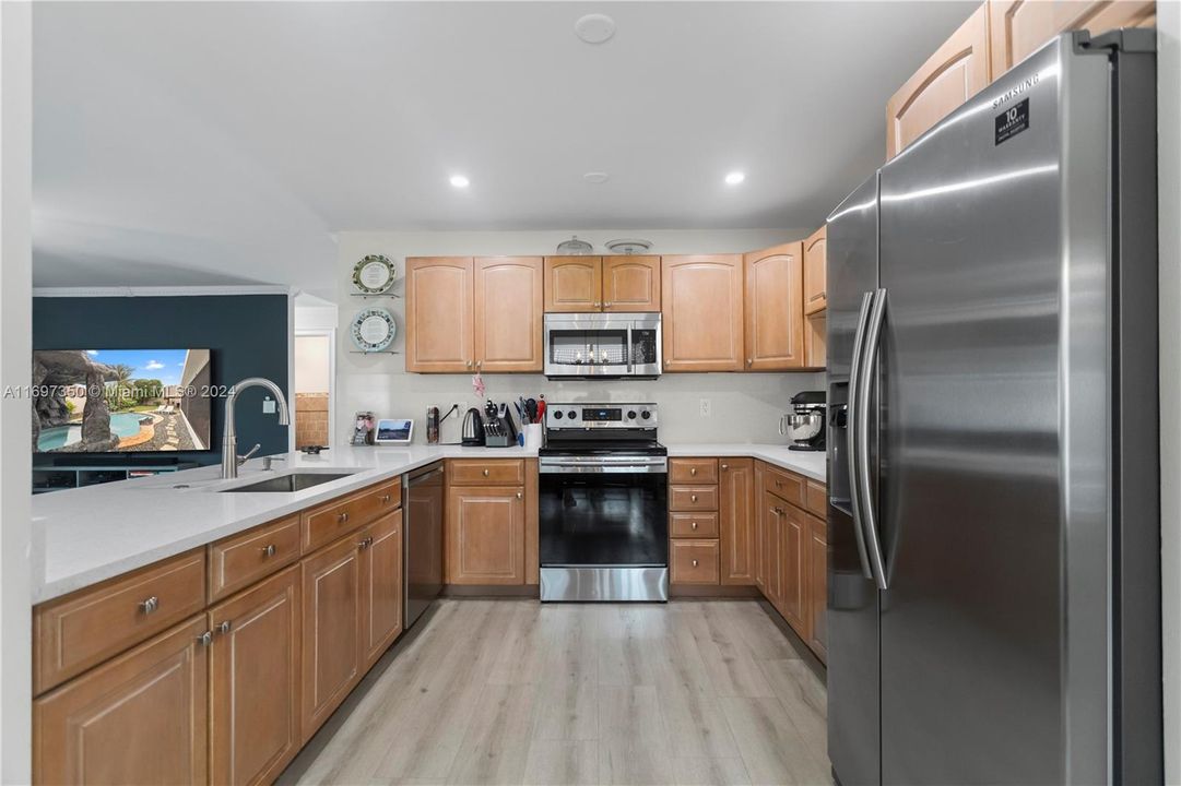 Open Kitchen to Dining Table and Family Room