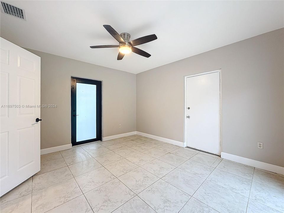 Office entrance and door to garage