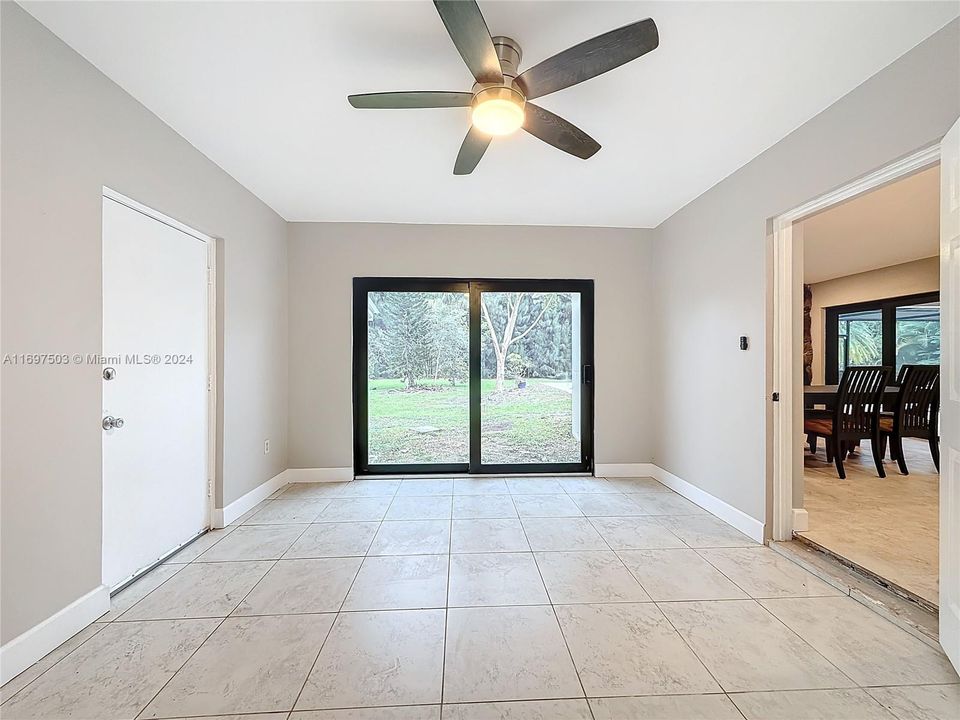 Office sliding door to pool and door to dining room