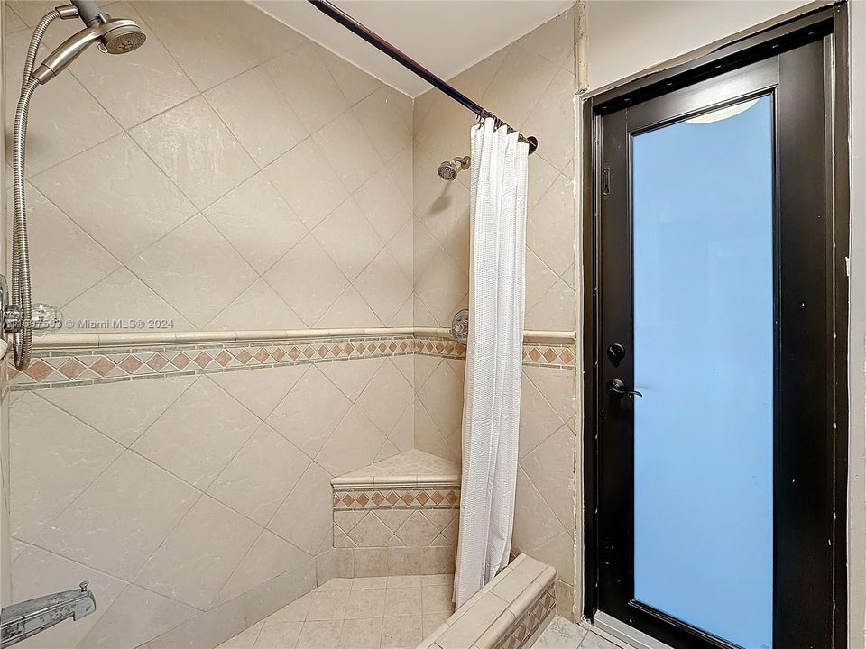 Bath 2 door to screened in patio/pool