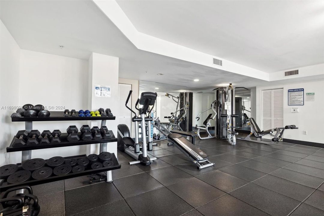 Gym overlooking the pool area