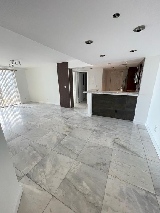 Entrance to dining room, living room and open kitchen