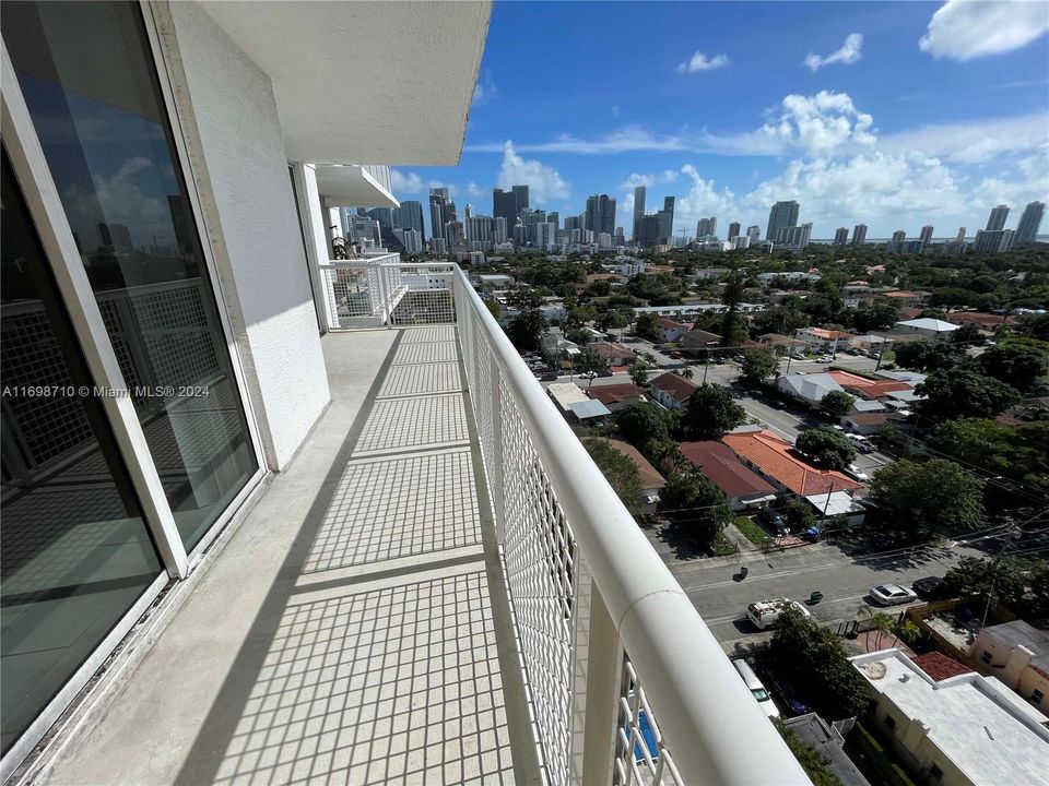 living room & bedroom open to large balcony