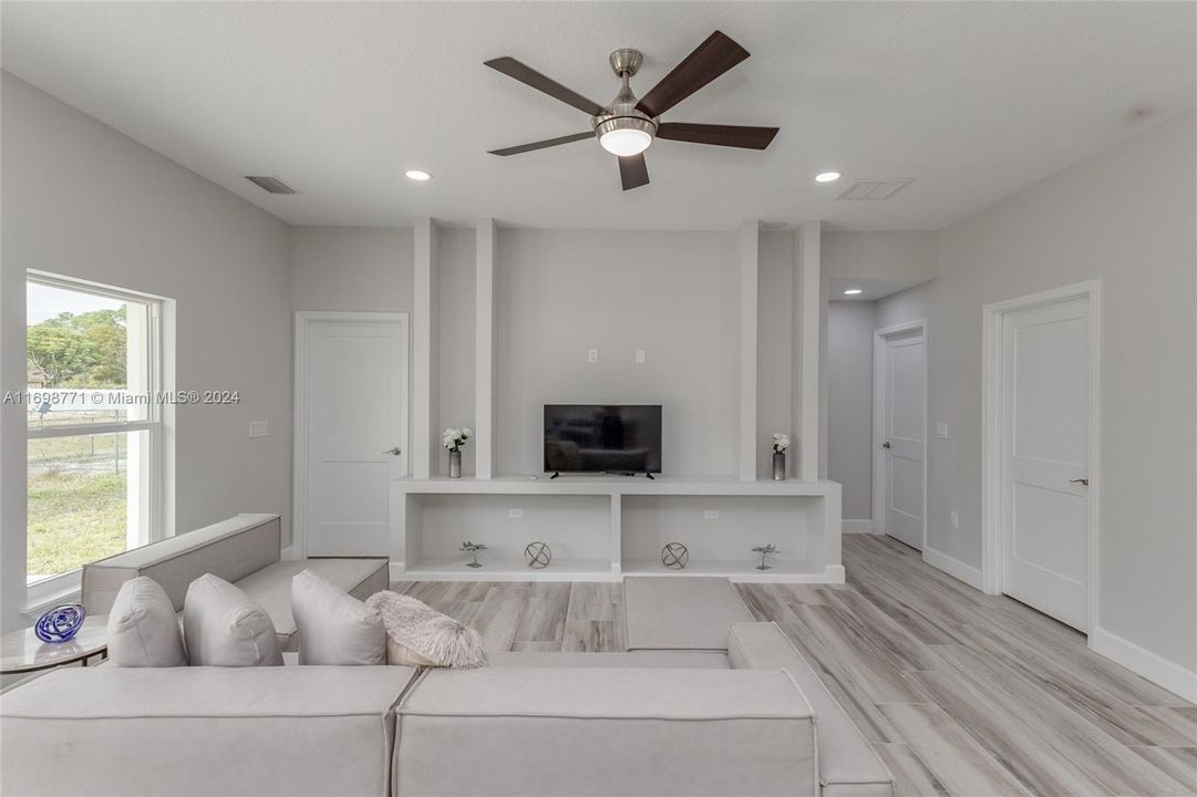 Main House Living Room with Built-in Entertainment Center