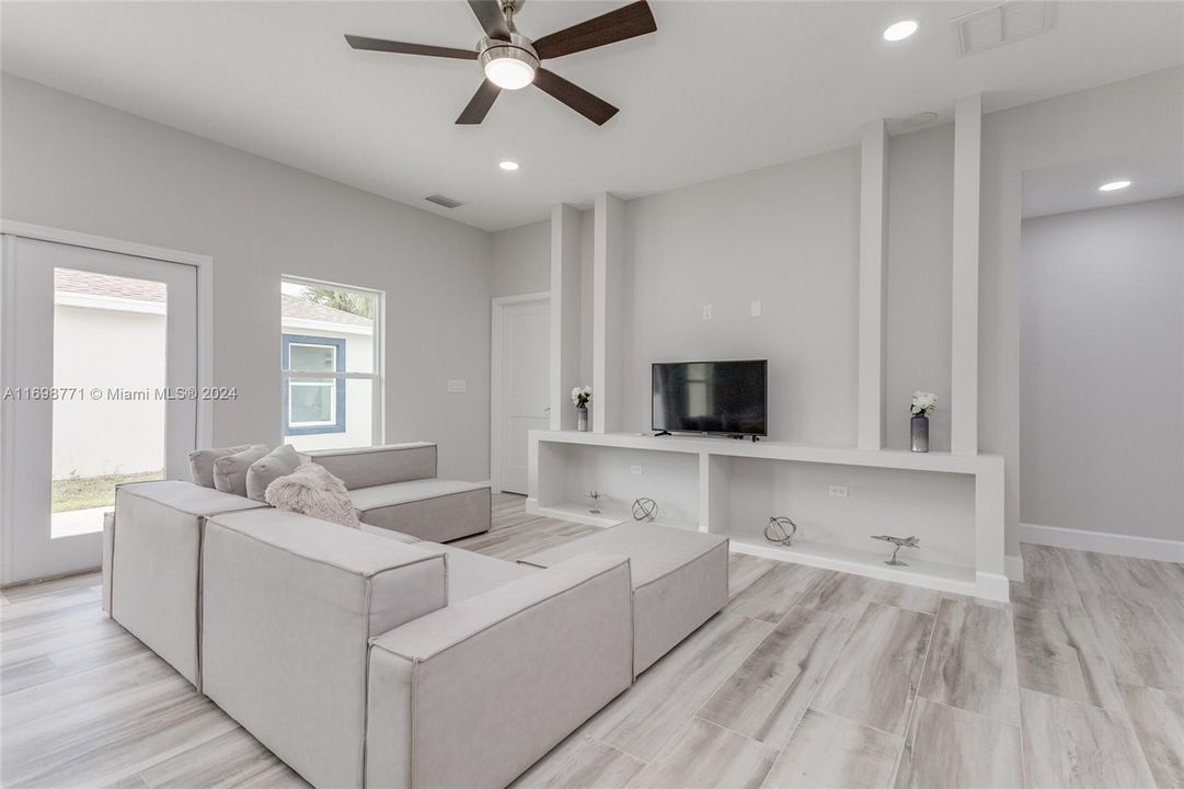 Main House Living Room with Built-in Entertainment Center