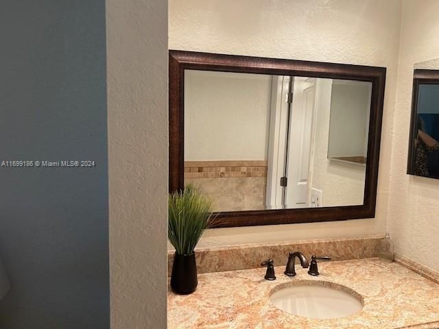 Separate Granite vanity sink area