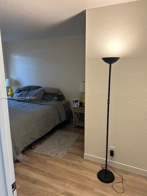 Master Bedroom w/ new flooring & paint