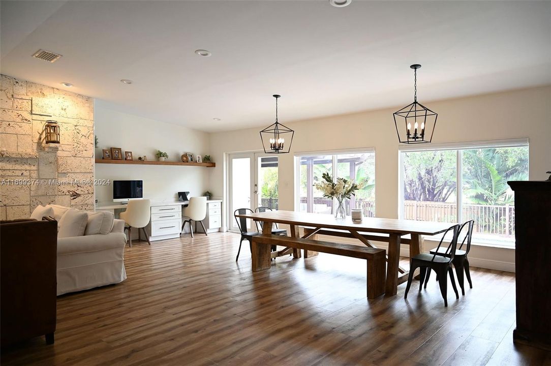 Dining room overlooks beautiful pool/patio with views to the park - no back neighbors!