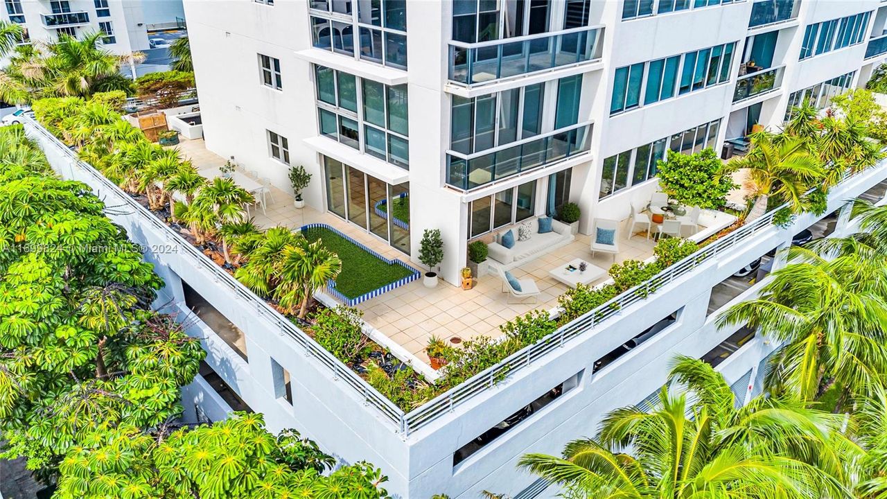 Largest terrace over 3000sf (furniture and putting green virtually staged)