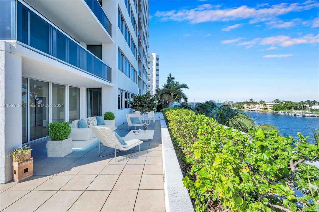 Largest terrace over 3000sf (furniture and putting green virtually staged)