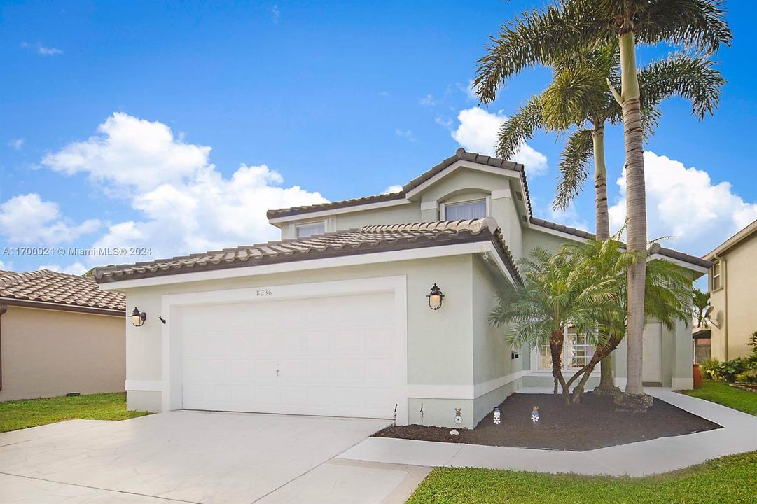 Double car garage and additional parking on drive way