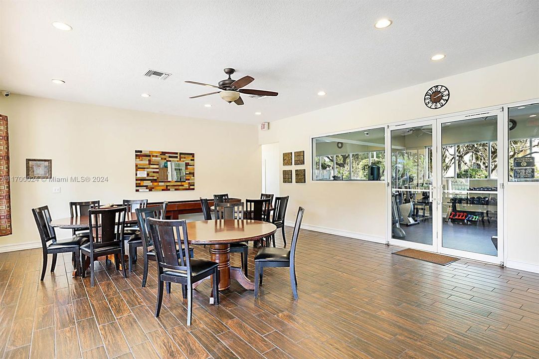 tables and chairs inside the clubhouse