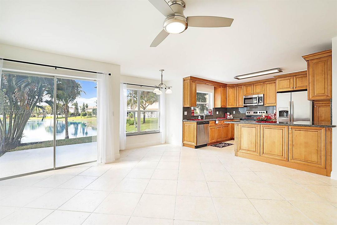 view of breakfast nook and family room