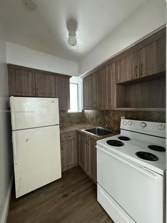 Kitchen unit #2 with brand new refrigerator ( on the way)