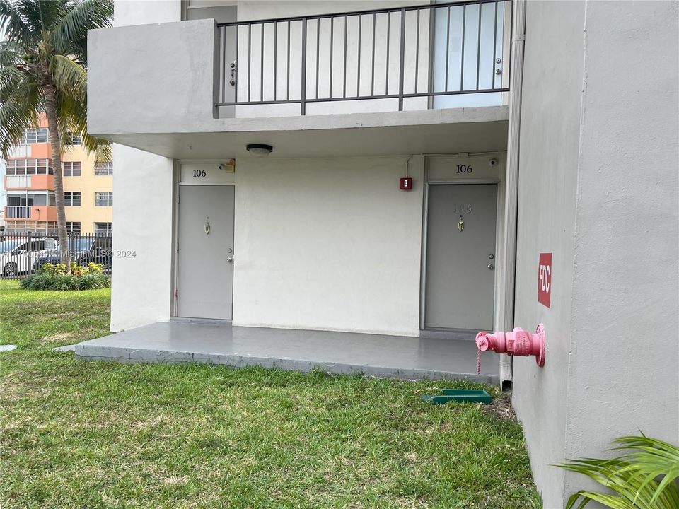 View of Kitchen & Front Entry Doors