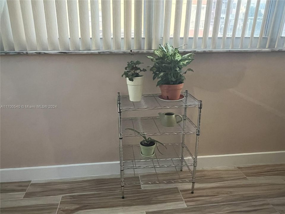 Florida Room/ Sunroom with tile flooring