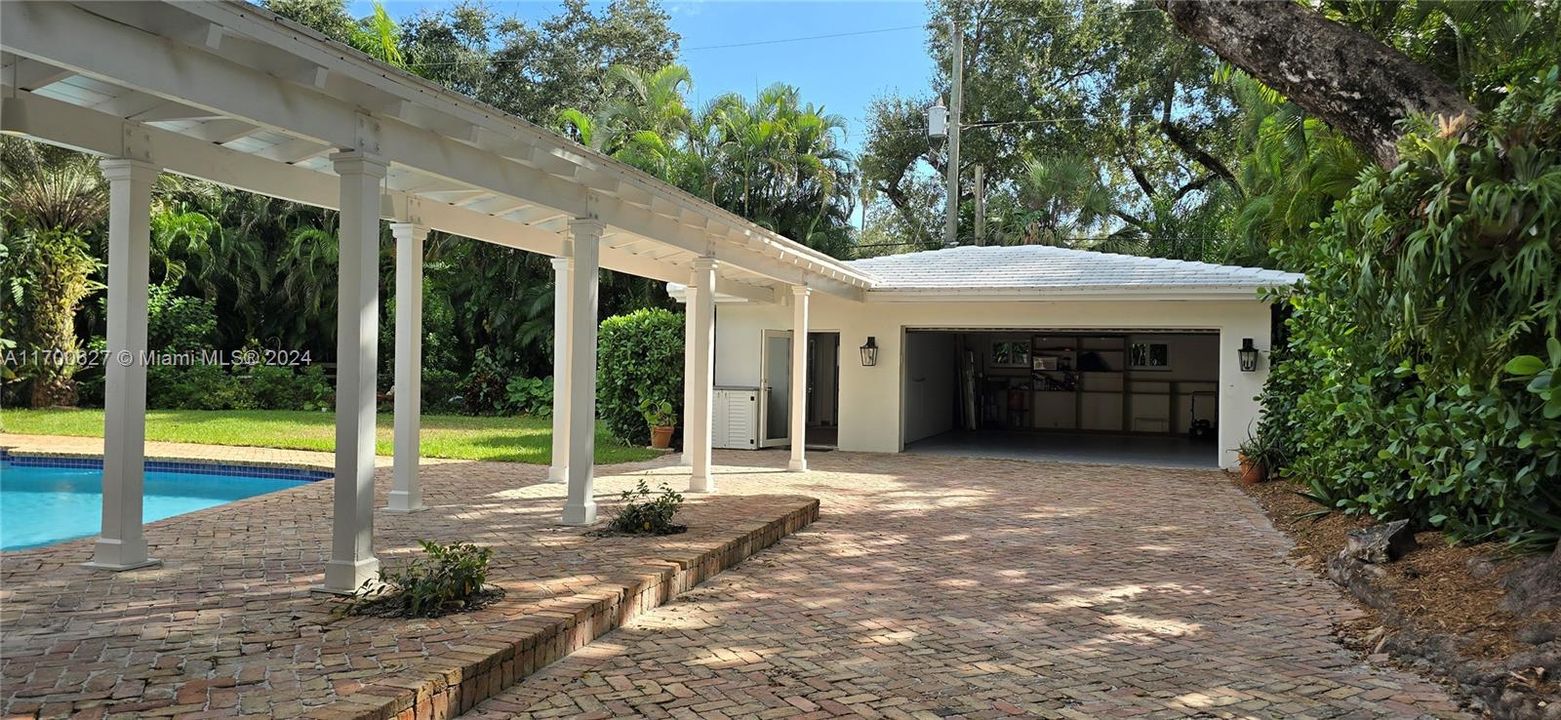 Breezeway to guest room/garage.