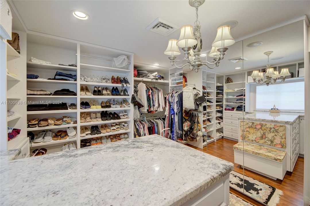 This is a DREAM closet! or a 6th bedroom!!