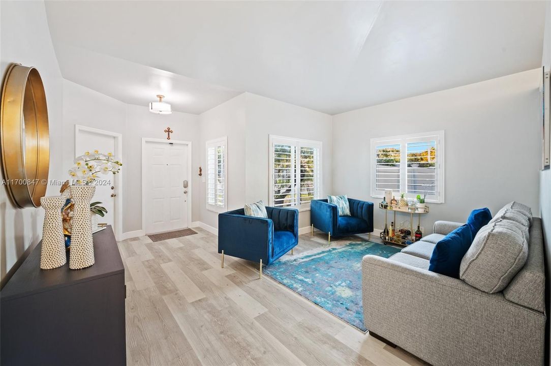 Gorgeous flooring, neutral walls and window treatments.