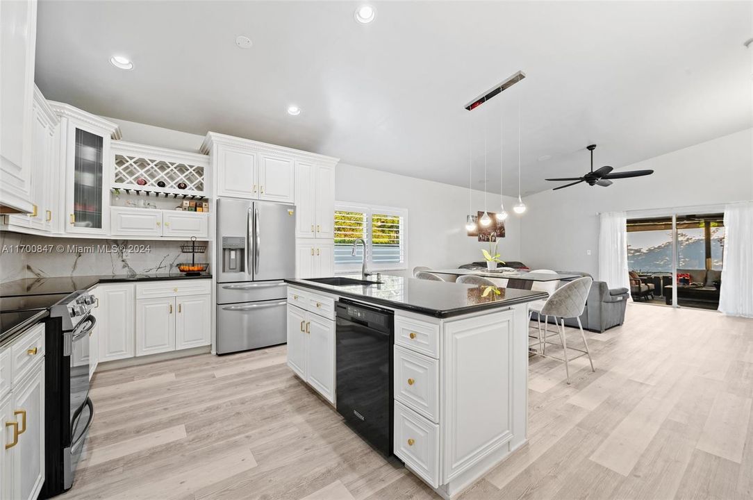 Kitchen opens to dining area.