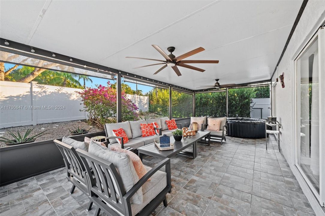 Large covered and screened patio.