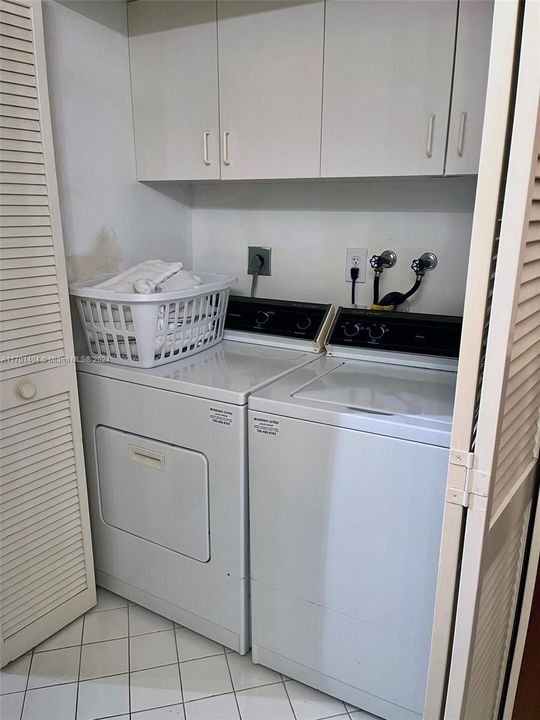 The laundry room is easily accessible within 1st floor 1/2 bathroom