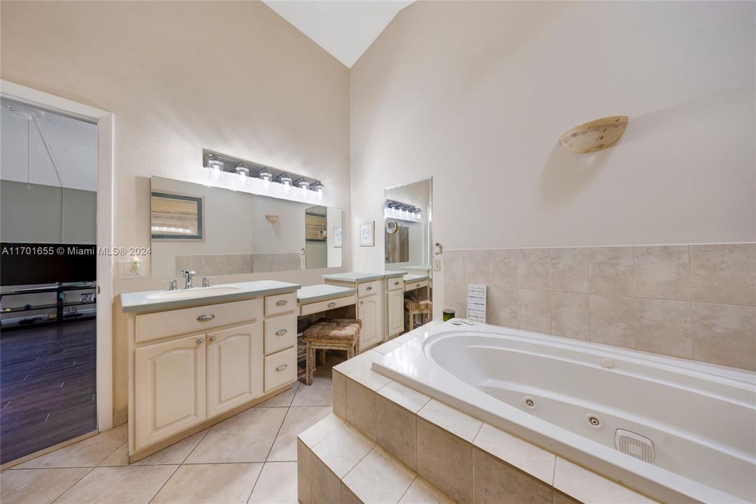 Jacuzzi tub to bathroom sink makeup area