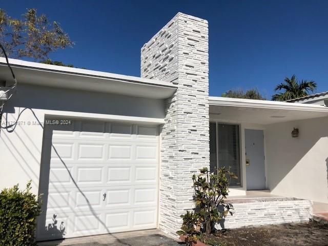 hurricane impact and remote controlled garage door , complete high impact windows and doors have been installed