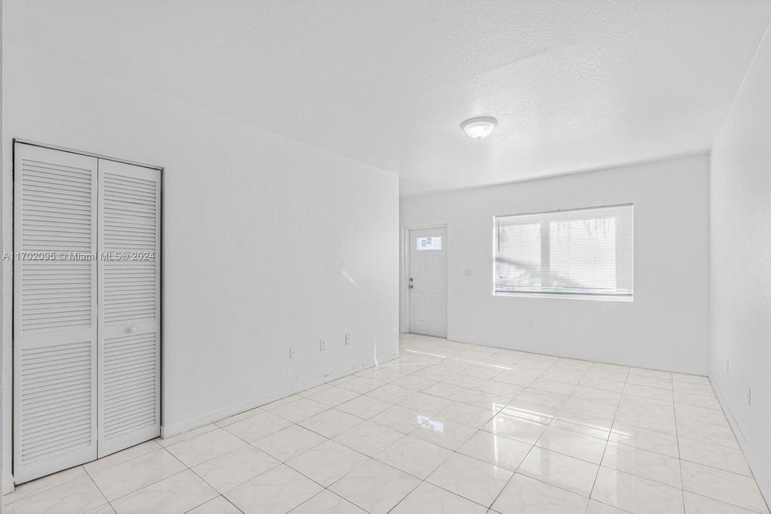 Living Room/Dining Room (Facing Front Door).