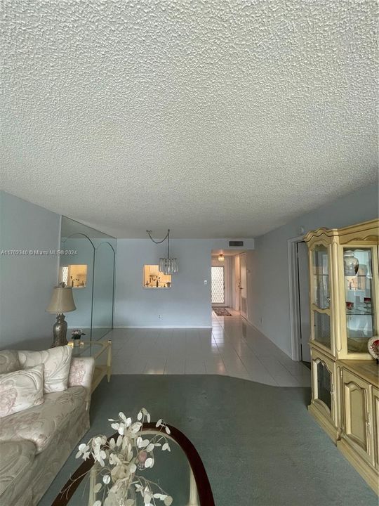 Lovely Dining/Living Area with Tile Floor.