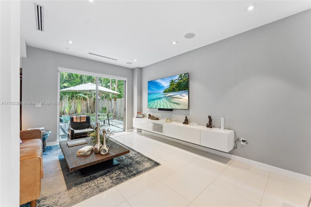 Living room with pool view